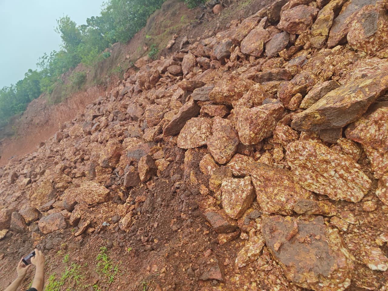Iron ore rock face at Tierra Milestone Karnataka mining site