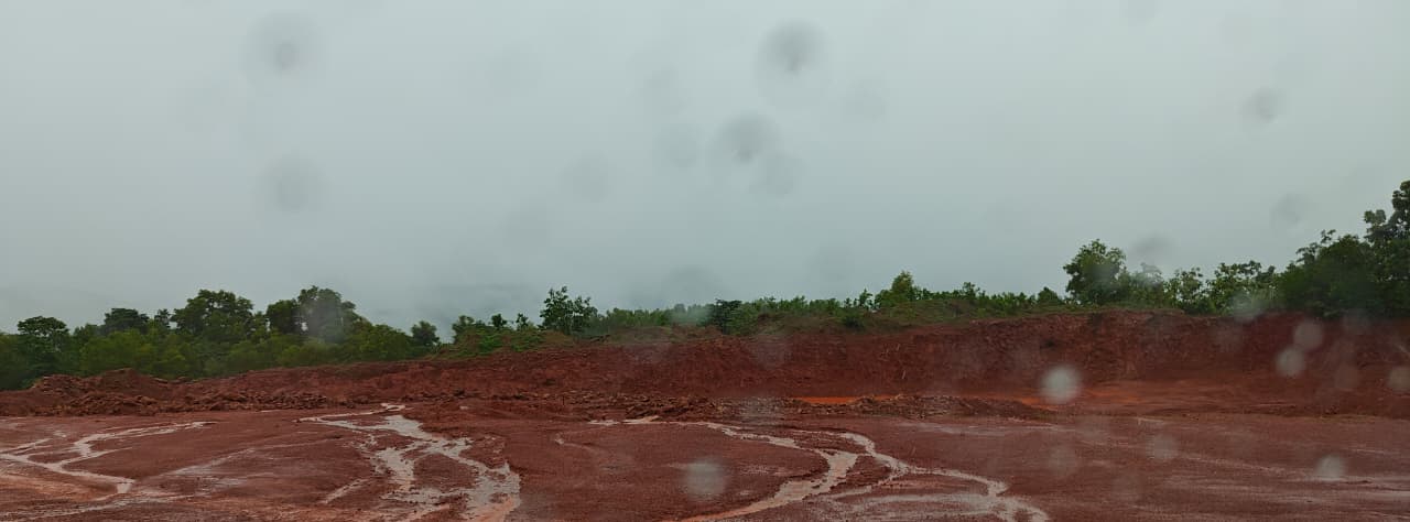 Tierra Milestone mining site during Karnataka monsoon — all-season operations